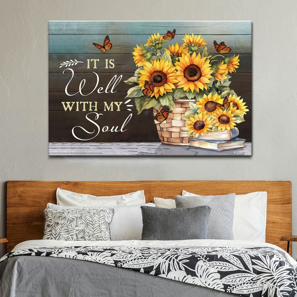 Christian wall art showcasing a pot of bright sunflowers and butterflies, inscribed with "It is Well With My Soul," ideal for thoughtful gifts.