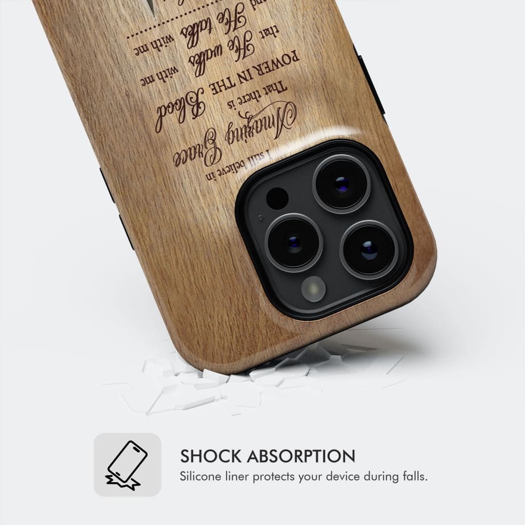 Christian phone case showcasing the phrase "I Still Believe In Amazing Grace," reflecting spiritual devotion.