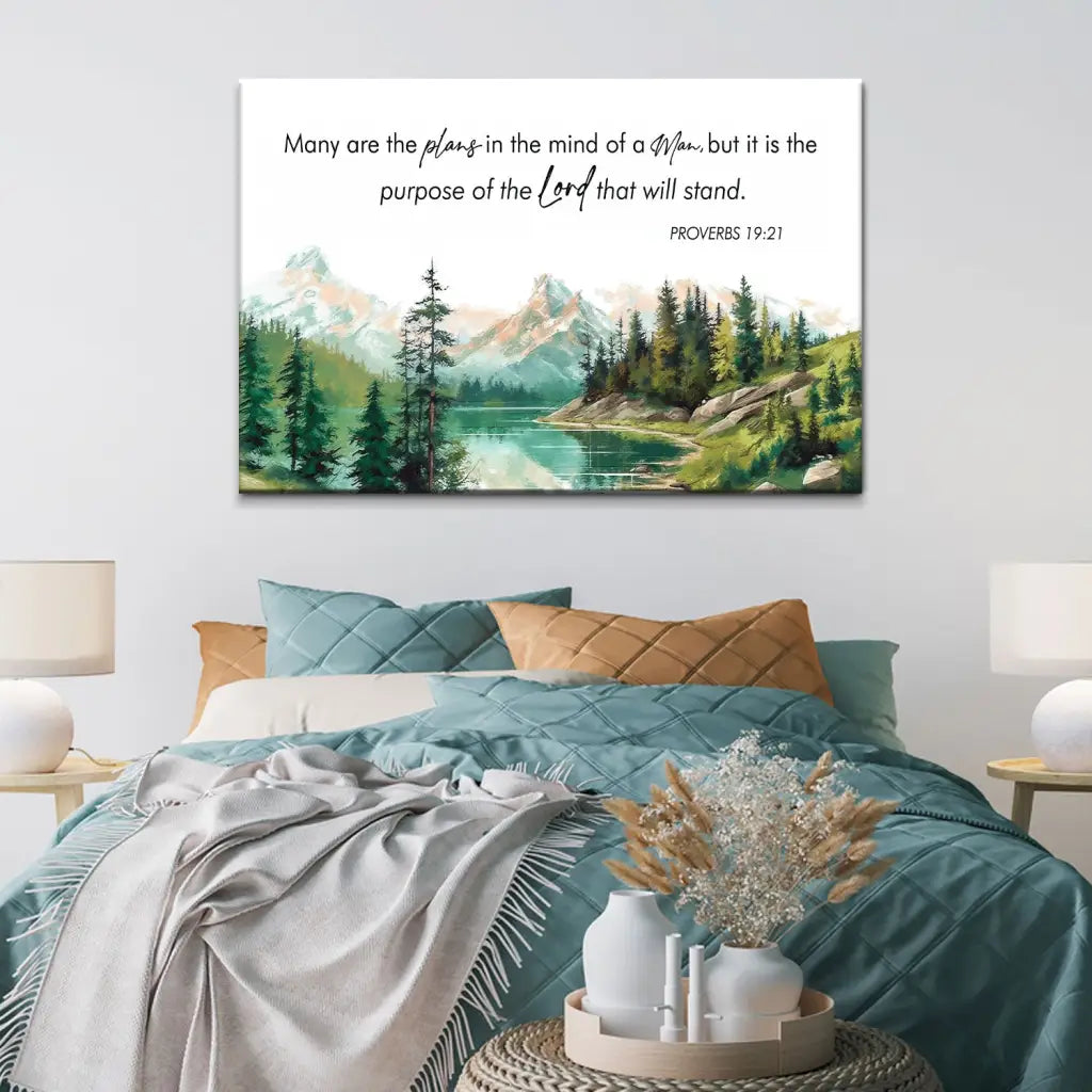 Scripture wall art featuring Proverbs 19:21, "Many Are The Plans," with a peaceful mountain and lake scene, perfect Christian decor.