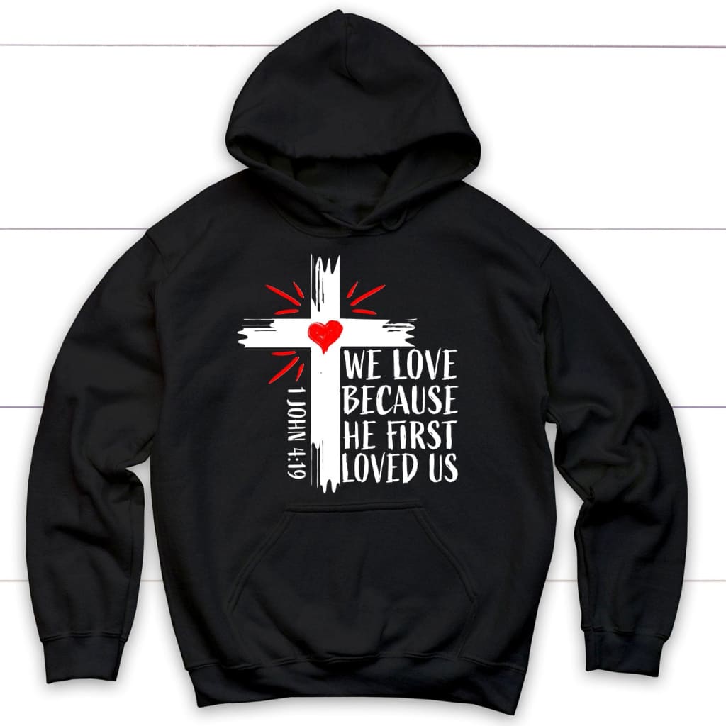 Christian hoodie: 1 John 4:19 We love because he first loved us hoodie Black / S