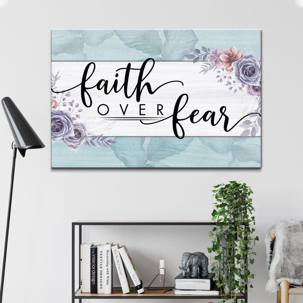 "Faith Over Fear" floral design wall art canvas with teal border, perfect for Christian home decor.