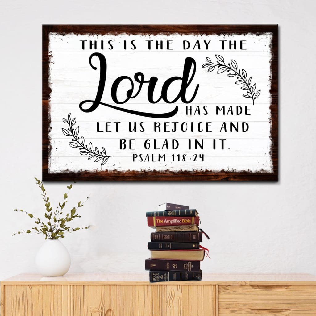 "This Is The Day The Lord Has Made" Bible verse wall art canvas with rustic border, white background.