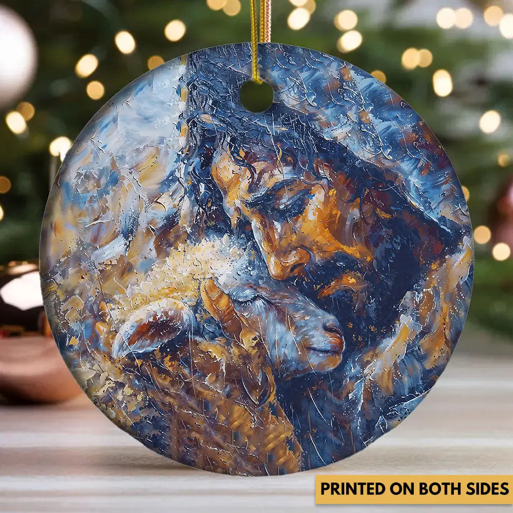 Christian Christmas ornament featuring Jesus and the lost sheep in abstract painting style.