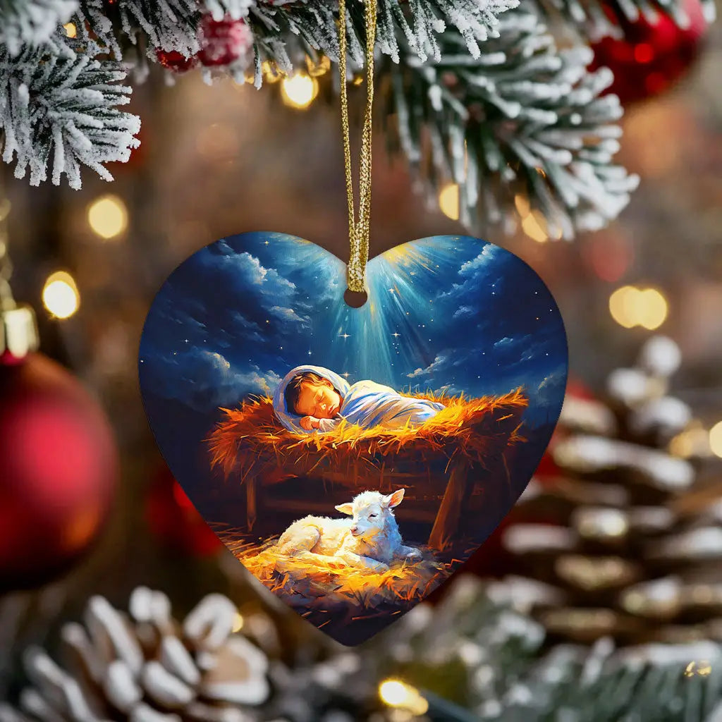 Faith-filled ornament of baby Jesus in the manger, accompanied by a lamb, for Christmas decor.