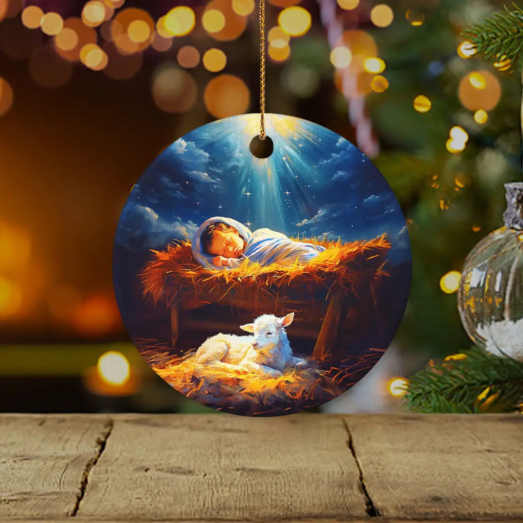 Christian Christmas ornament of baby Jesus with a lamb in the manger, symbolizing faith and love / Circle.