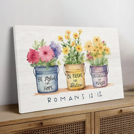 Christian wall art canvas: "Be joyful in hope, patient in affliction, faithful in prayer" Romans 12:12, with flower pots.