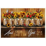 Faith-based decor featuring Psalm 46:10 and a beautiful mason jar flower arrangement, perfect for inspiration and tranquility.