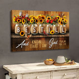 Christian wall art with Psalm 46:10, "Be still and know that I am God," featuring a mason jar with flowers, perfect for home decor.