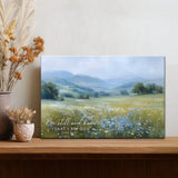 Christian wall art with gentle hills and light flowers inspiring peace and stillness.