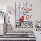 Faith-based Christmas wall art displaying a red cardinal on a branch with Psalm 46:10, "Be Still and Know That I Am God," great religious holiday decor.