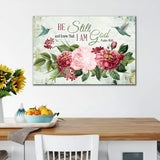 Bible verse wall art canvas featuring "Be Still and Know That I Am God," with vintage flowers and a hummingbird, perfect for faith-filled decor.