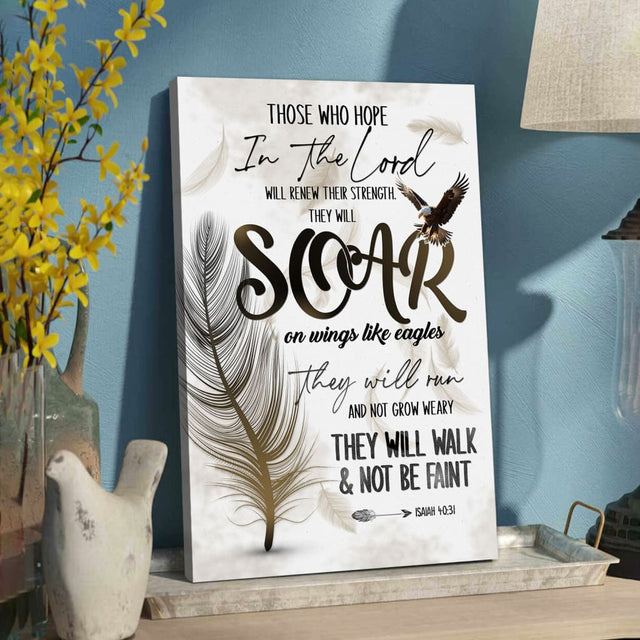 Bible verse wall art canvas featuring Isaiah 40:31, "Soar on Wings Like Eagles," with a feather design, perfect for faith-based decor.