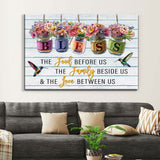 Inspirational canvas print with "Bless the Food Before Us" and flowers in jars, ideal Christian gift for home decor.