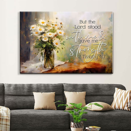 Inspirational canvas print with 2 Timothy 4:17 Bible verse and vase of daisies, ideal Christian gift for homes.