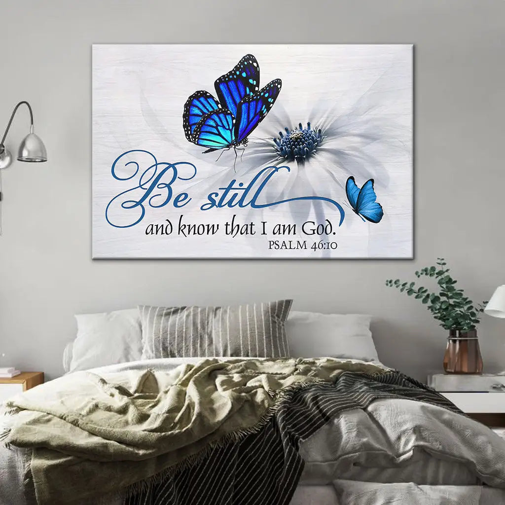 Faith-based wall art displaying "Be Still And Know That I Am God" with butterfly and flower, great religious decor for Christian homes.