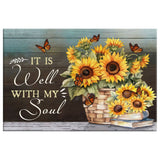 Inspirational canvas art displaying cheerful sunflowers, fluttering butterflies, and the reassuring words "It is Well With My Soul," great for Christian gifts.