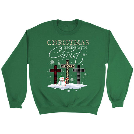Christmas Begins With Christ Crosses Snowman Christmas Sweatshirt Irish Green / S