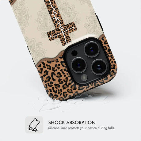 Faith-based phone case showcasing a leopard print cross design, perfect for those who want to express their religion stylishly.
