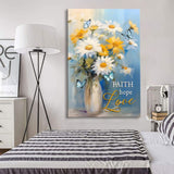 Christian wall art featuring "Faith, Hope, Love" with butterflies and daisies in a vase, ideal for a peaceful space.