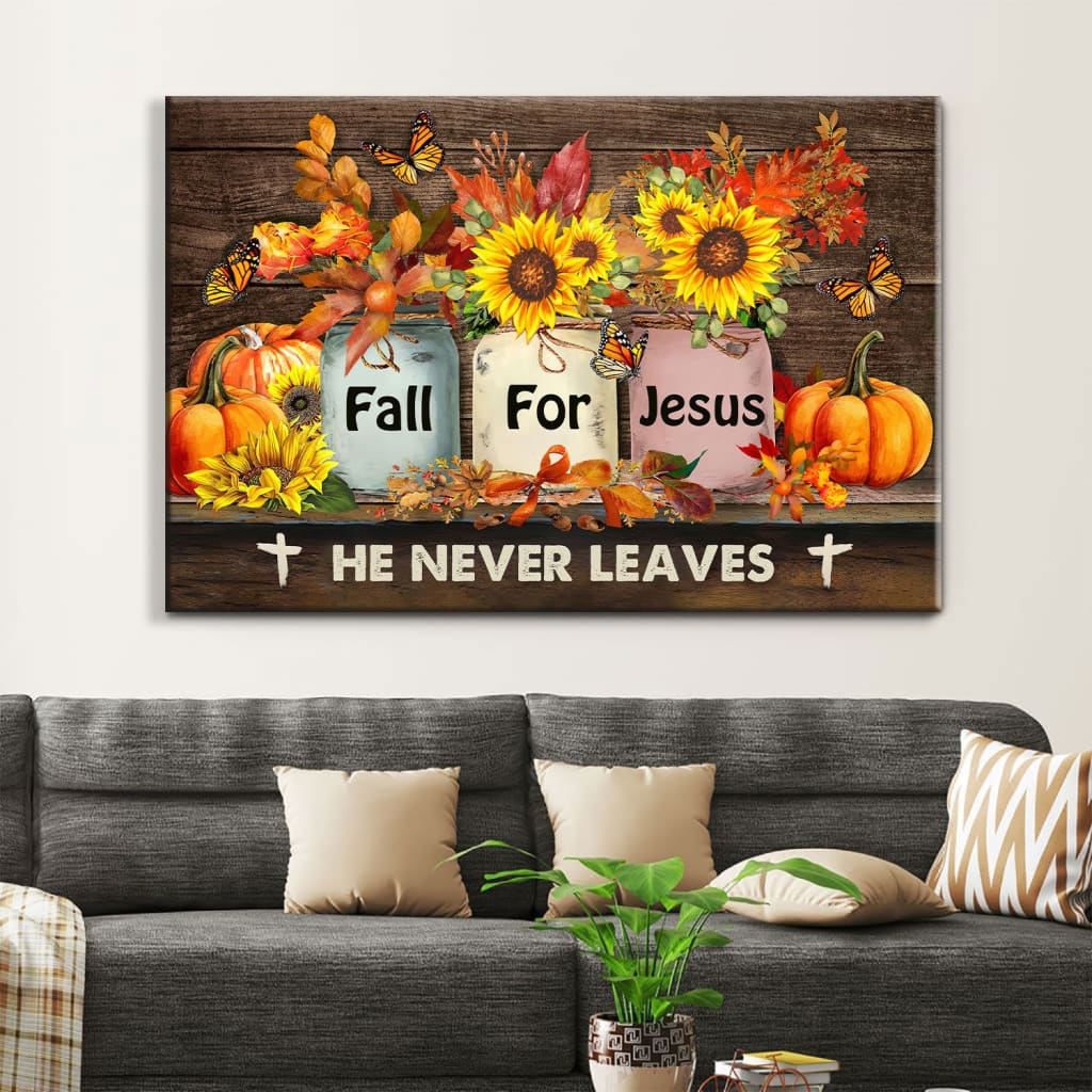 Thanksgiving wall art with &quot;Fall For Jesus - He Never Leaves&quot; alongside fall flowers and pumpkins, ideal Christian autumn wall art.