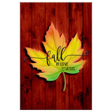 Faith-based wall art displaying "Fall in Love With Jesus" with a red background and autumn leaves, great religious decor for Christian homes.