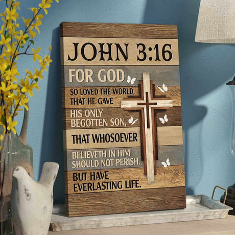 Christian wall art with John 3:16 "For God So Loved the World," featuring a cross and butterflies on a wooden background.