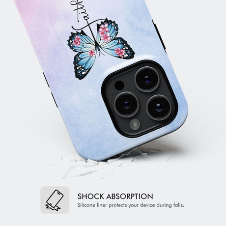 Faith-based phone case with the quote "God is Within Her She Will Not Fall" and a cross with butterfly artwork.