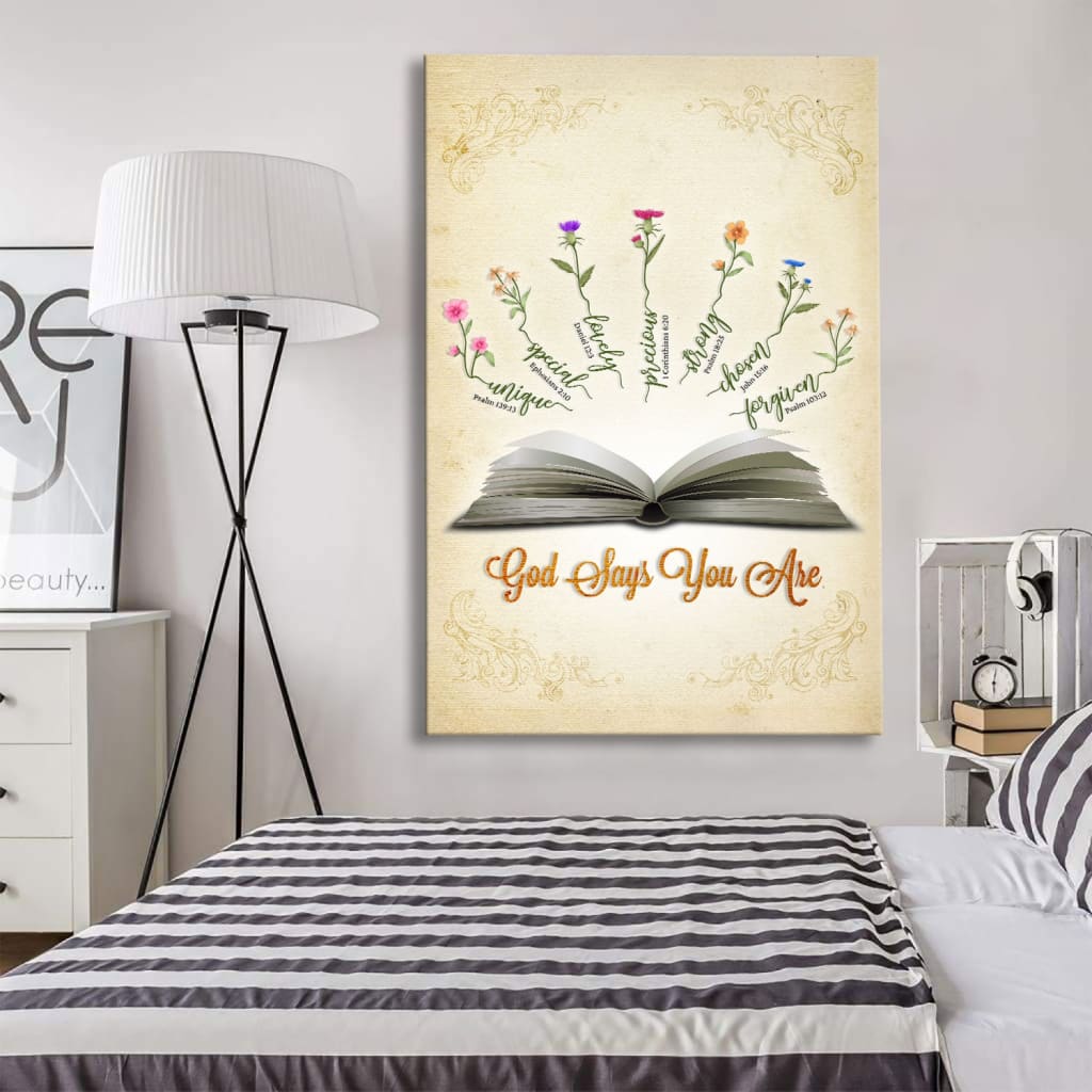Inspirational canvas with "God Says You Are," paired with Bible verses and flowers, a meaningful Christian decor piece.