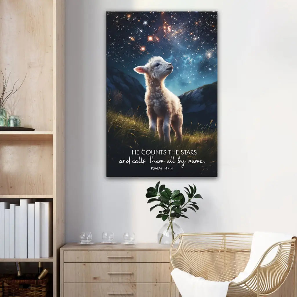 Bible verse wall art canvas, &quot;He Counts the Stars&quot; Psalm 147:4, featuring sheep under a starry night sky.