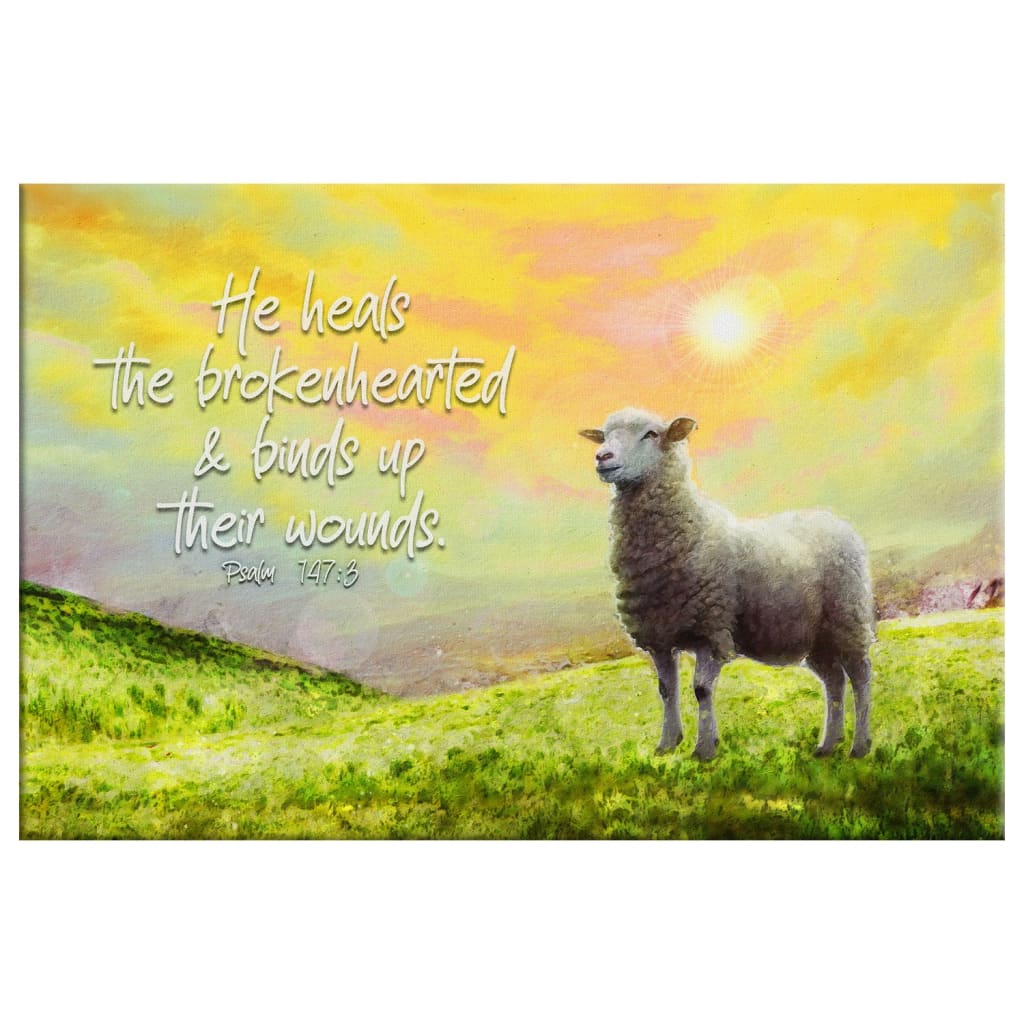 Christian canvas print featuring Psalm 147:3, "He Heals the Brokenhearted," with sheep, ideal faith wall decor.
