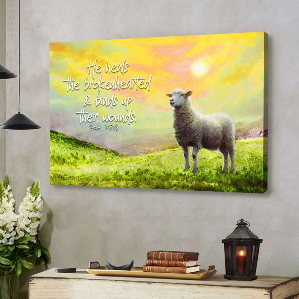 Religious wall art canvas with Psalm 147:3 and sheep, "He Heals the Brokenhearted," perfect for Christian homes.