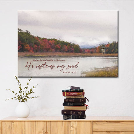 Psalm 23:2-3 wall art canvas featuring a peaceful lake scene, "He Leads Me Beside Still Waters, He Restores My Soul," Christian wall decor.