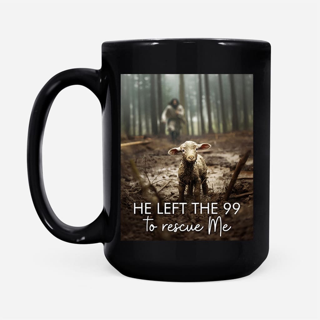 Christian mug featuring the design of Jesus rescuing a lost sheep with the phrase, &quot;He Left the 99 to Rescue Me.&quot; Black / 15 oz
