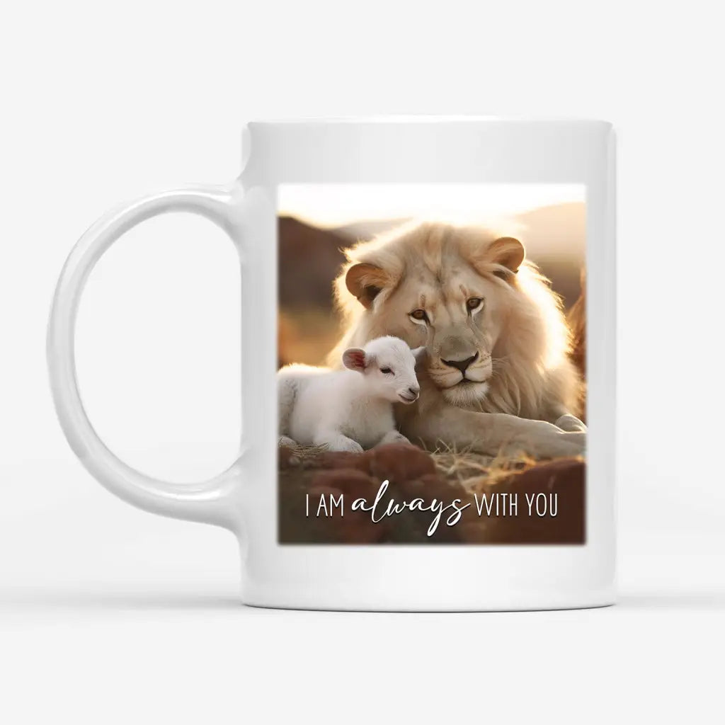 Inspirational coffee mug with &quot;I Am Always With You,&quot; depicting a lion and lamb in a peaceful field, ideal for Christian home decor.
