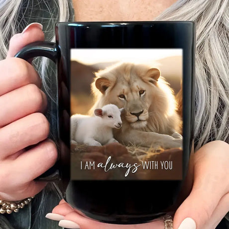 Inspirational coffee mug with "I Am Always With You," depicting a lion and lamb in a peaceful field, ideal Christian gift for loved ones / Black.