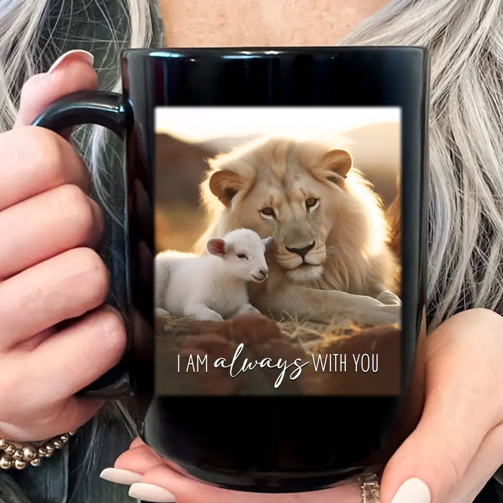 Inspirational coffee mug with &quot;I Am Always With You,&quot; depicting a lion and lamb in a peaceful field, ideal Christian gift for loved ones / Black.