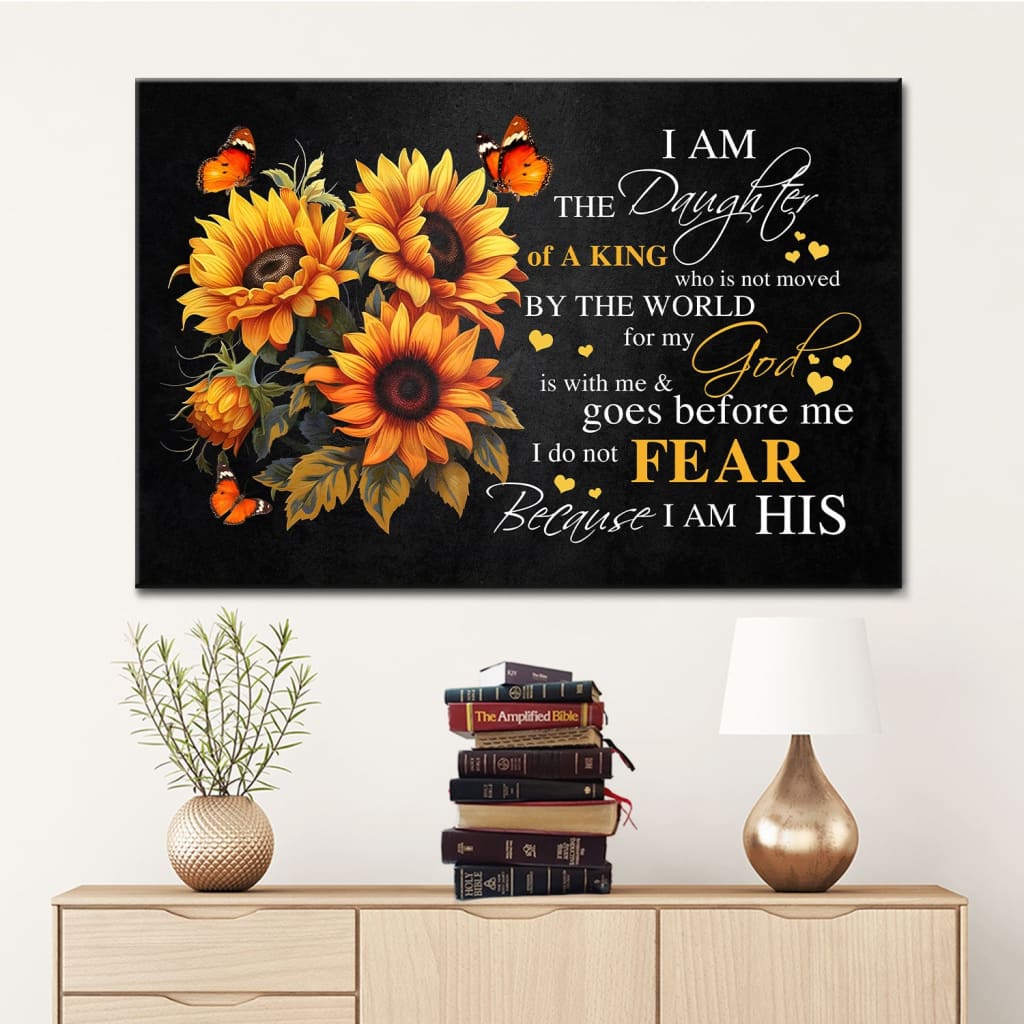Christian canvas wall art with sunflowers, butterflies, and quote, "I am the daughter of a King who is not moved by the world."
