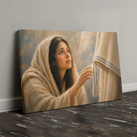 Christian wall art canvas showing the woman touching the hem of Jesus' robe for healing.