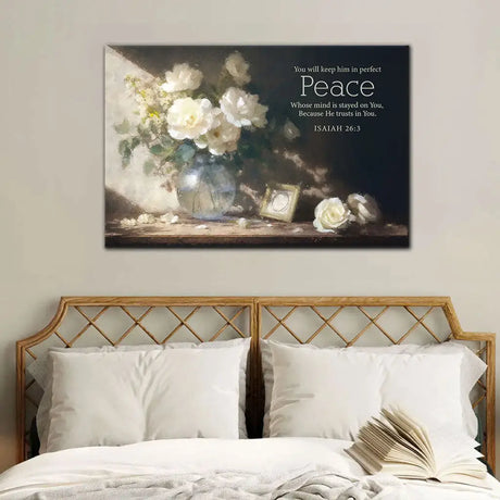 Faith-based wall decor with Isaiah 26:3, "You will keep him in perfect peace," paired with a calming floral arrangement.