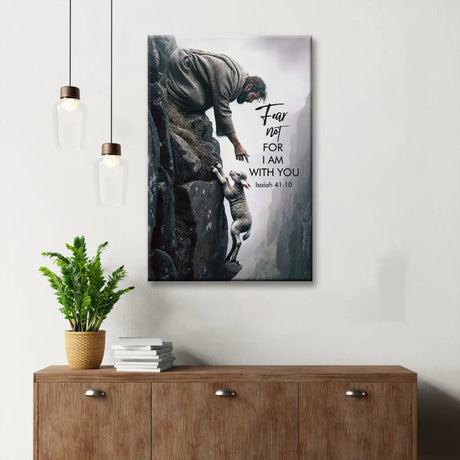 Inspiring canvas art with "Fear Not, For I Am With You" from Isaiah 41:10 and Jesus rescuing a lamb.