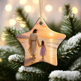 Christian gift ornament featuring Jesus walking beside a child on the beach