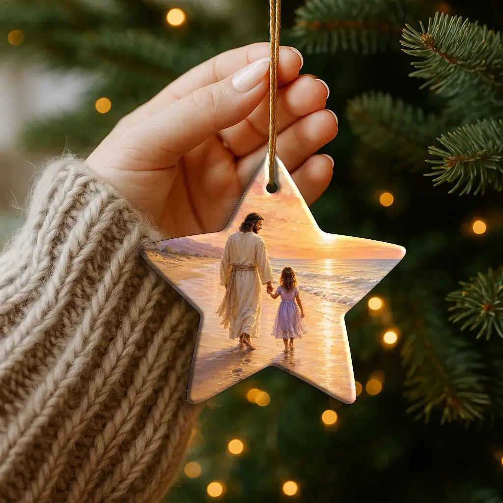 Beautiful Christian ornament with Jesus and little girl by the ocean at sunset
