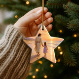 Beautiful Christian ornament with Jesus and little girl by the ocean at sunset