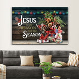 Faith-based Christmas wall art displaying "Jesus Is the Reason for the Season" with red cardinals and festive design, great religious holiday decor.