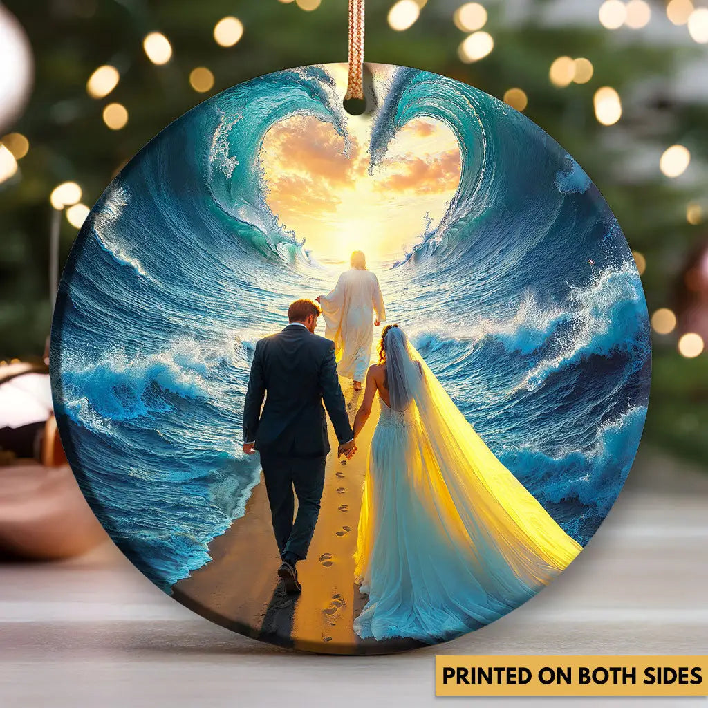 Faith-based ornament of Jesus leading a couple through storms, symbol of strength and love.