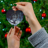 Inspirational ornament of Jesus in a snowy forest saving a sheep, perfect for Christmas decor.