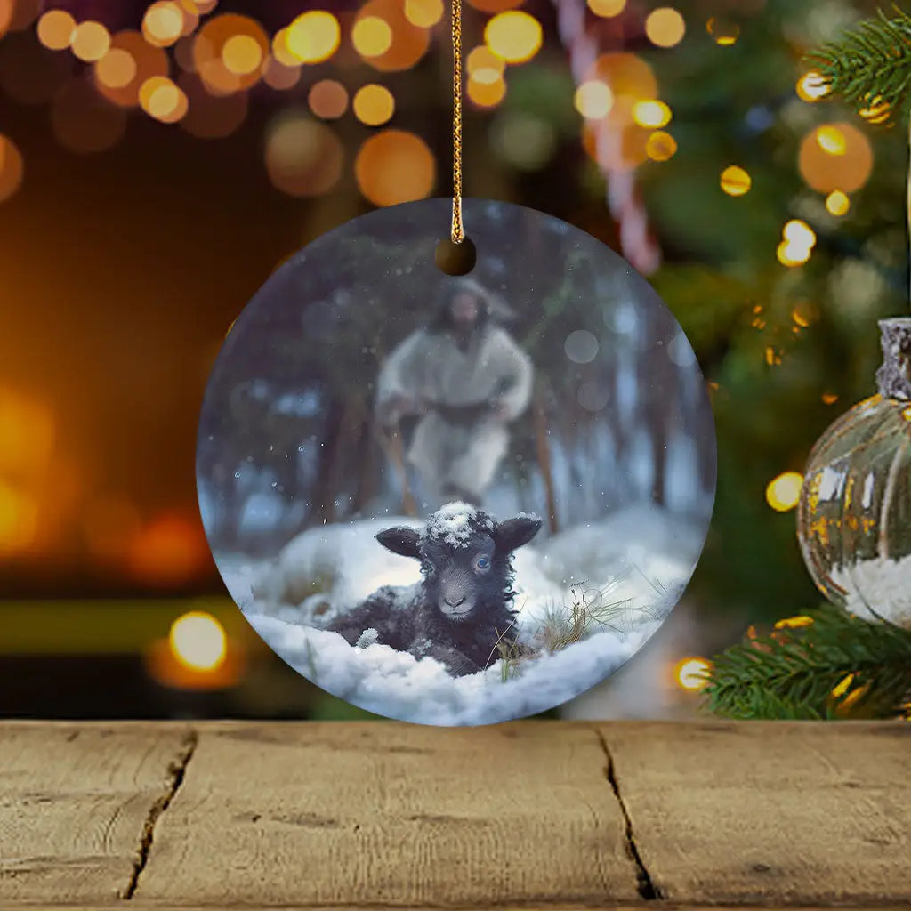 Faith-based Christmas ornament featuring Jesus running to save a lost sheep in a snowy forest / Circle.