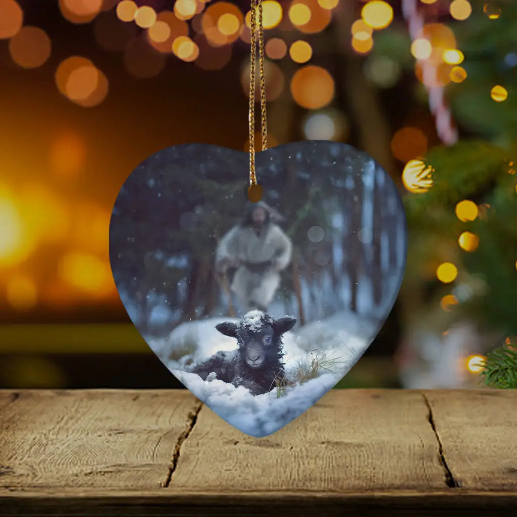 Jesus rescuing a lost sheep ornament, a faith-filled holiday decor piece and heartfelt gift / Heart.