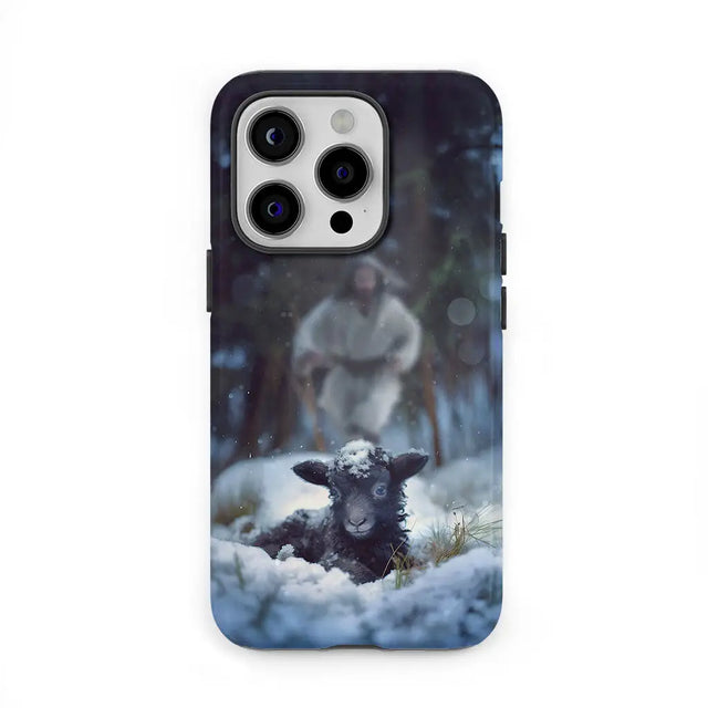 Christian phone case with Jesus running to rescue a lost sheep in a snowy forest, symbolizing divine love and care.