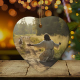 Inspirational Christmas ornament featuring a lamb running to Jesus, symbolizing love and faith / Heart.